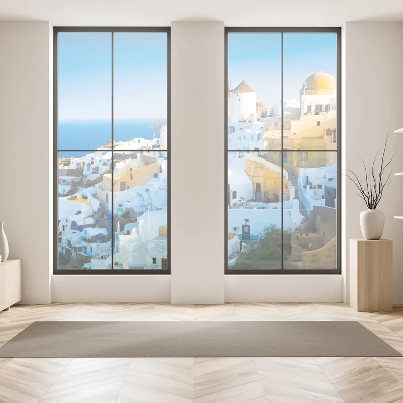 Naklejka na okno nasłonecznione miasteczko Santorini nad morzem