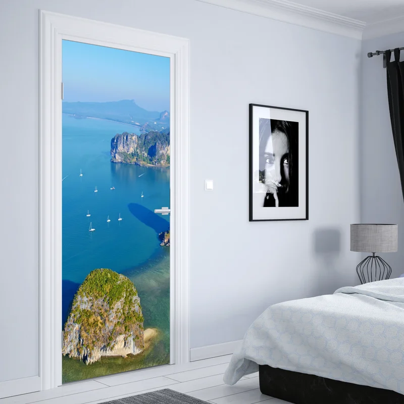 Türaufkleber türkise insel- und klippenlandschaft