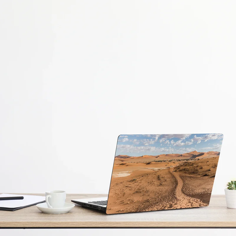 Laptop-Aufkleber weite wüstendünen unter blauem himmel