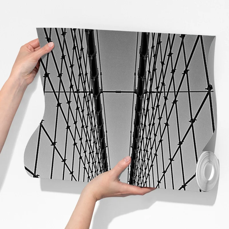 Fototapeta symetryczny most wiszący w czerni i bieli Fototapeta symetryczny most wiszący w czerni i bieli