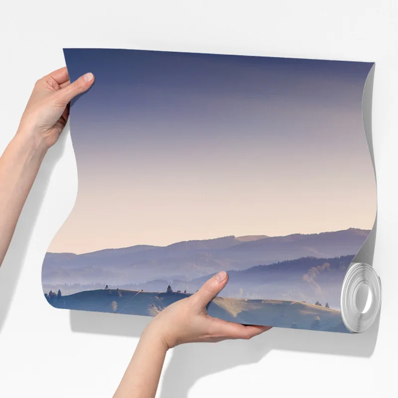 Fototapete Sonnenuntergang in den Karpaten über sanften grünen Hügeln Fototapete Sonnenuntergang in den Karpaten über sanften grünen Hügeln