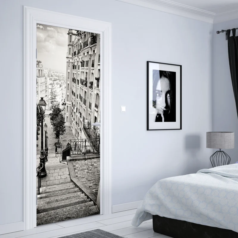 Türaufkleber städtische treppe in schwarzweiß