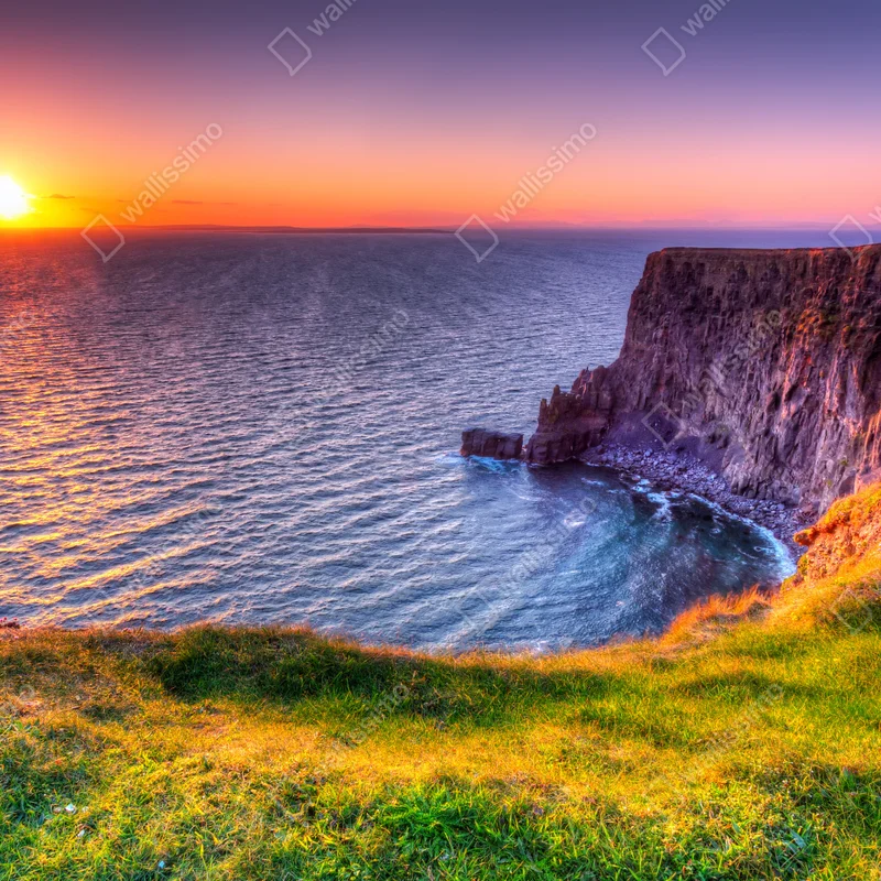 Naklejka na laptopa zachód słońca nad skalistymi klifami Naklejka na laptopa zachód słońca nad skalistymi klifami