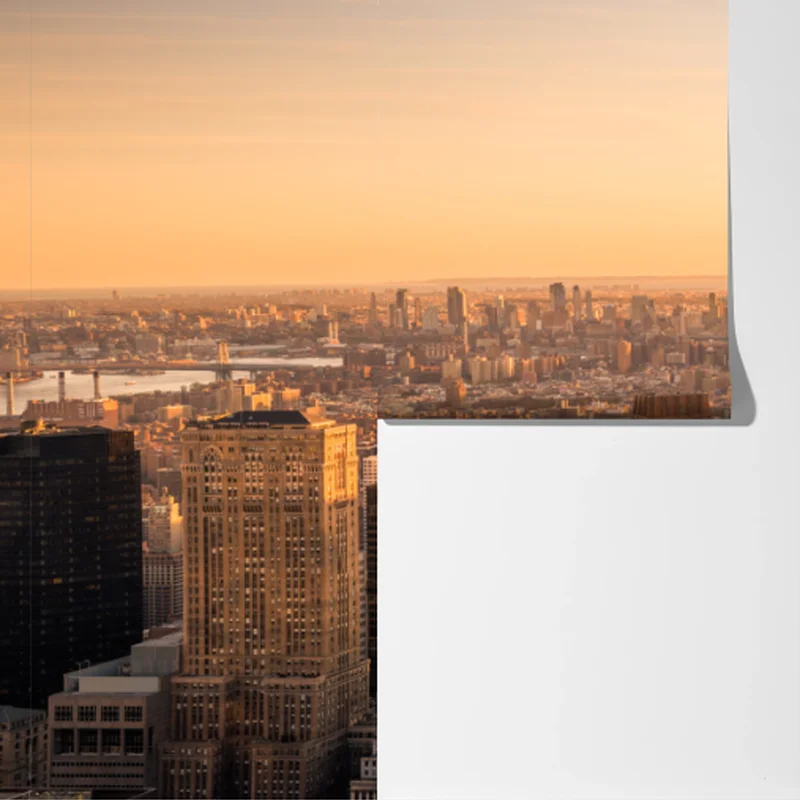 Fototapete goldener sonnenuntergang über der skyline von New York Fototapete goldener sonnenuntergang über der skyline von New York