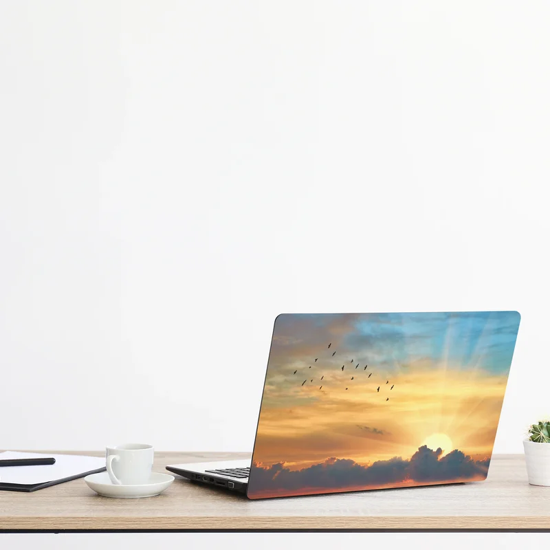 Laptop-Aufkleber goldener sonnenaufgang über den wolken Laptop-Aufkleber goldener sonnenaufgang über den wolken