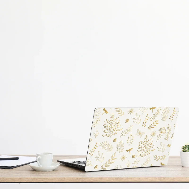 Naklejka na laptopa złoty botaniczny wzór