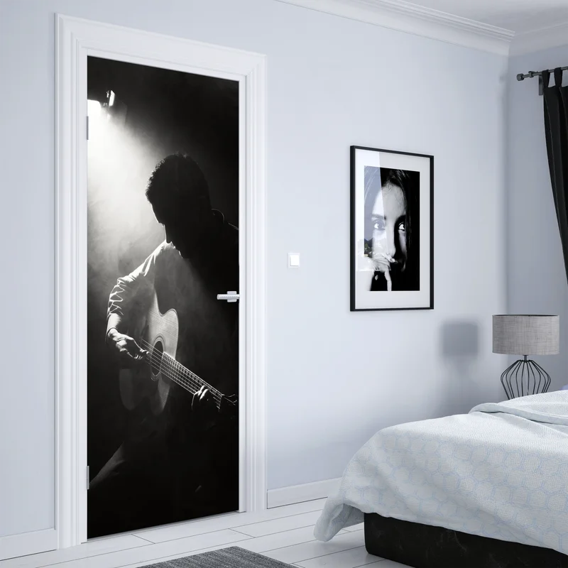 Türaufkleber silhouette eines gitaristen im scheinwerferlicht