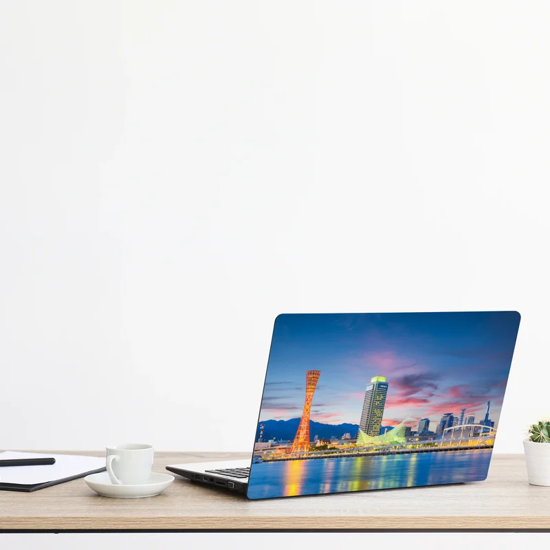 Naklejka na laptopa Kobe panorama portu o zmierzchu