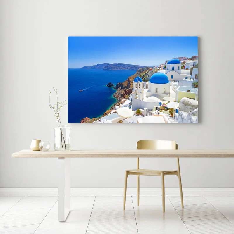 Leinwandbild Santorini blaue kuppeln über der kaldera Leinwandbild Santorini blaue kuppeln über der kaldera