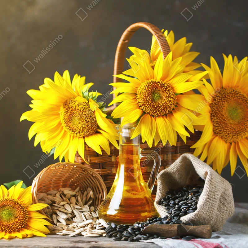 Fototapete leuchtendes stillleben mit sonnenblumen, kernen und öl Fototapete leuchtendes stillleben mit sonnenblumen, kernen und öl