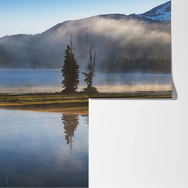 Fototapete nebliger bergspiegel am see bei sonnenaufgang Fototapete nebliger bergspiegel am see bei sonnenaufgang