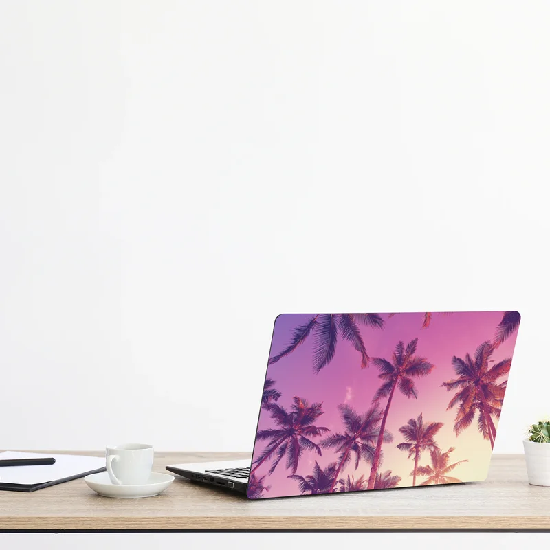 Naklejka na laptopa tropikalne palmy o zachodzie słońca Naklejka na laptopa tropikalne palmy o zachodzie słońca