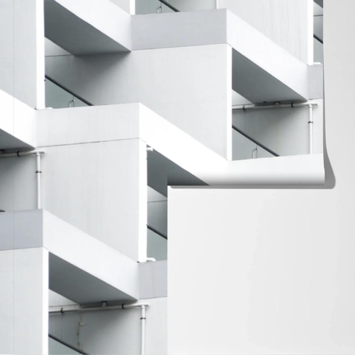 Fototapete weiße betonfassade im geometrischen muster Fototapete weiße betonfassade im geometrischen muster