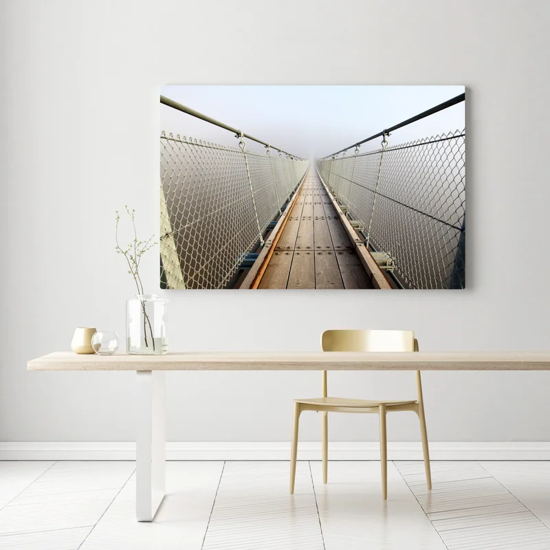Leinwandbild neblige hängebrücke die in den nebel führt Leinwandbild neblige hängebrücke die in den nebel führt