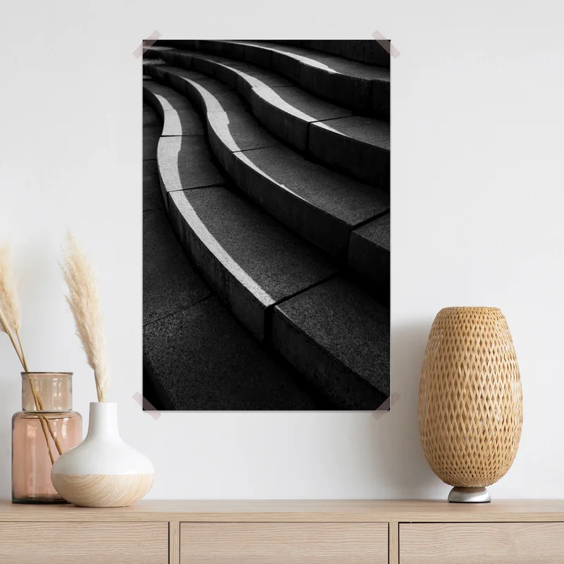 Poster geschwungene betontreppe im schatten Poster geschwungene betontreppe im schatten