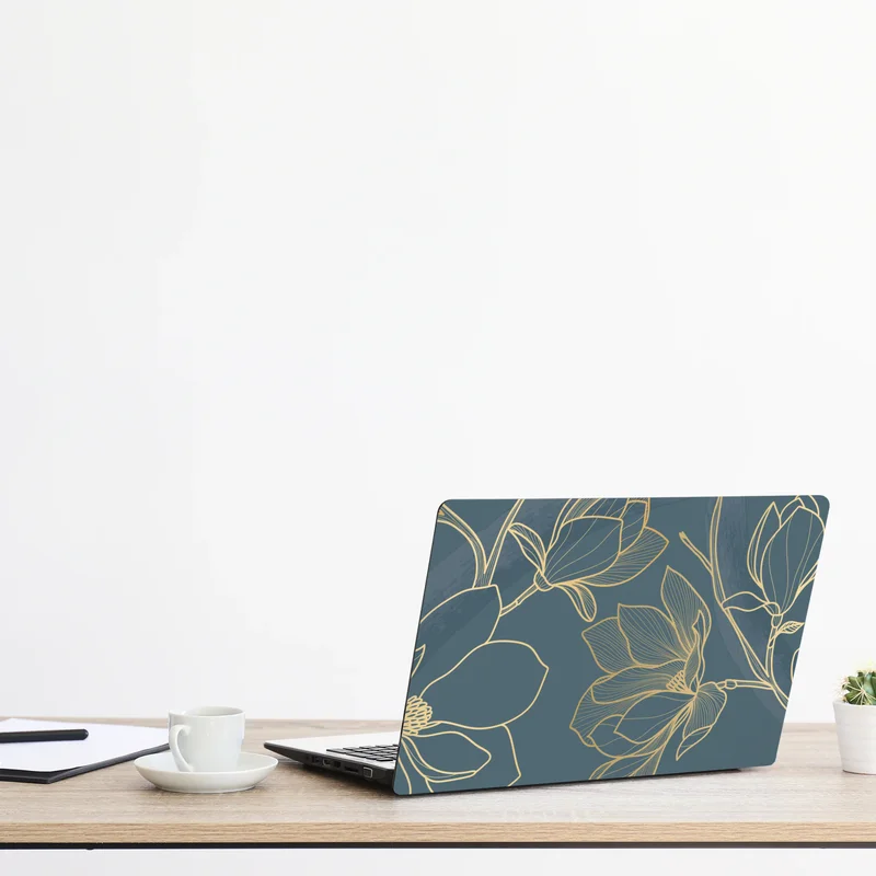 Naklejka na laptopa złota magnolia na turkusowym tle Naklejka na laptopa złota magnolia na turkusowym tle