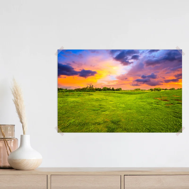 Poster sonnenuntergang über grüner wiese Poster sonnenuntergang über grüner wiese