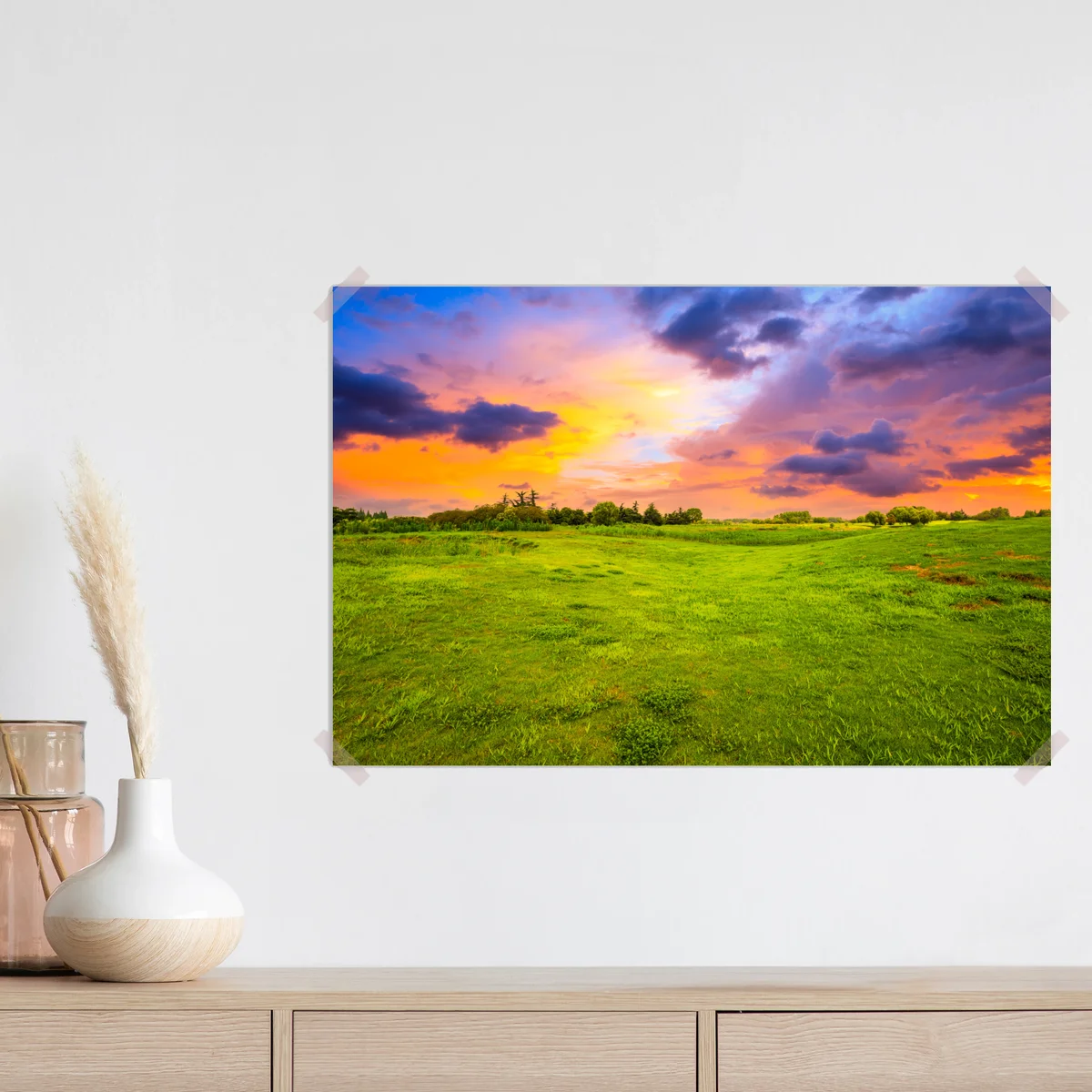 Poster sonnenuntergang über grüner wiese Poster sonnenuntergang über grüner wiese