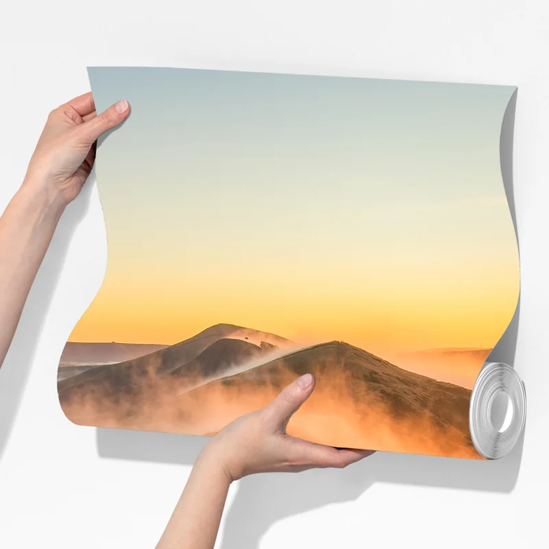 Fototapeta wschód słońca nad mglistym grzbietem z kamienną ścieżką Fototapeta wschód słońca nad mglistym grzbietem z kamienną ścieżką