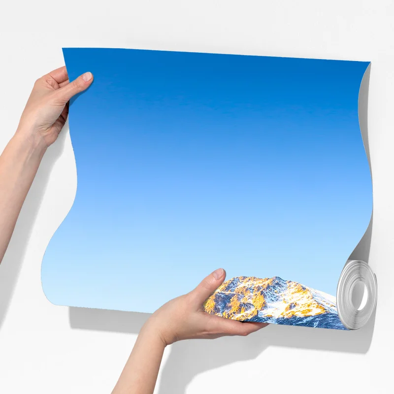 Fototapete winterlicher sonnenaufgang über dem gefrorenen bergsee Fototapete winterlicher sonnenaufgang über dem gefrorenen bergsee