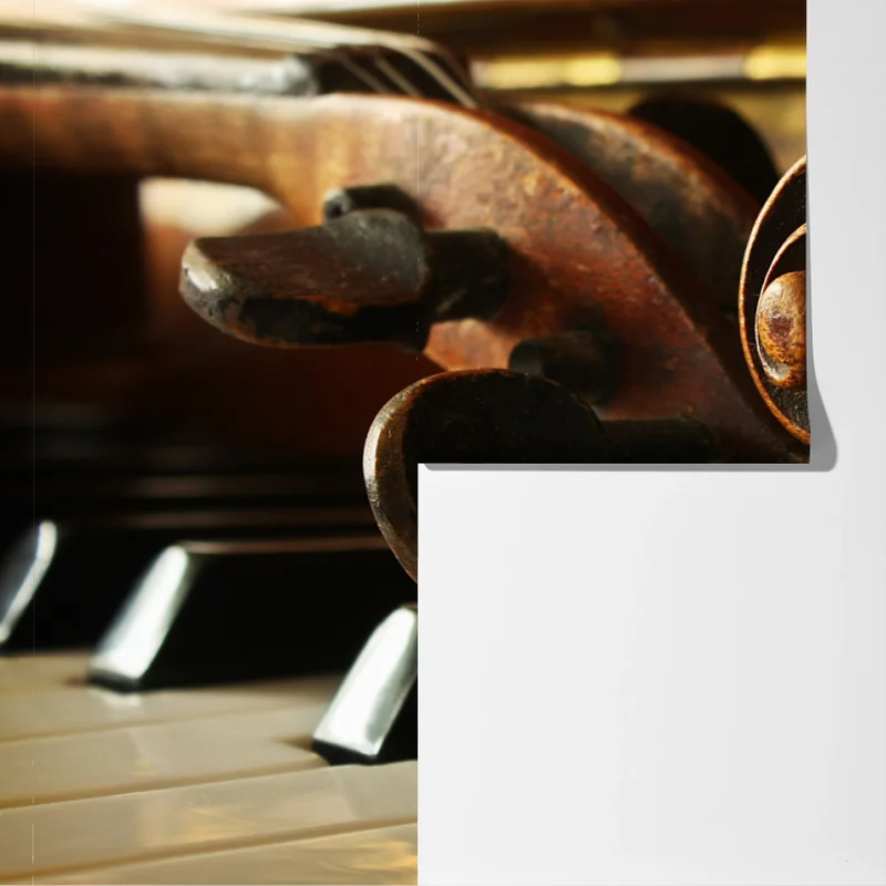 Fototapete vintage geigenkopf auf klaviertasten Fototapete vintage geigenkopf auf klaviertasten