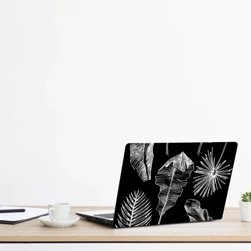 Naklejka na laptopa monochromatyczna kompozycja liści