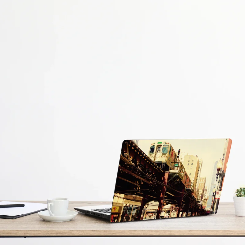 Laptop-Aufkleber retro hochbahn über der stadtstraße Laptop-Aufkleber retro hochbahn über der stadtstraße