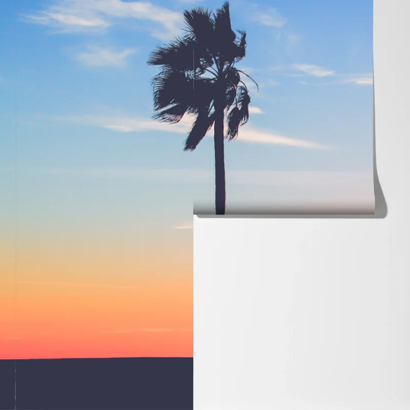 Fototapete sonnenuntergang am strand mit palmen und rettungsturm Fototapete sonnenuntergang am strand mit palmen und rettungsturm