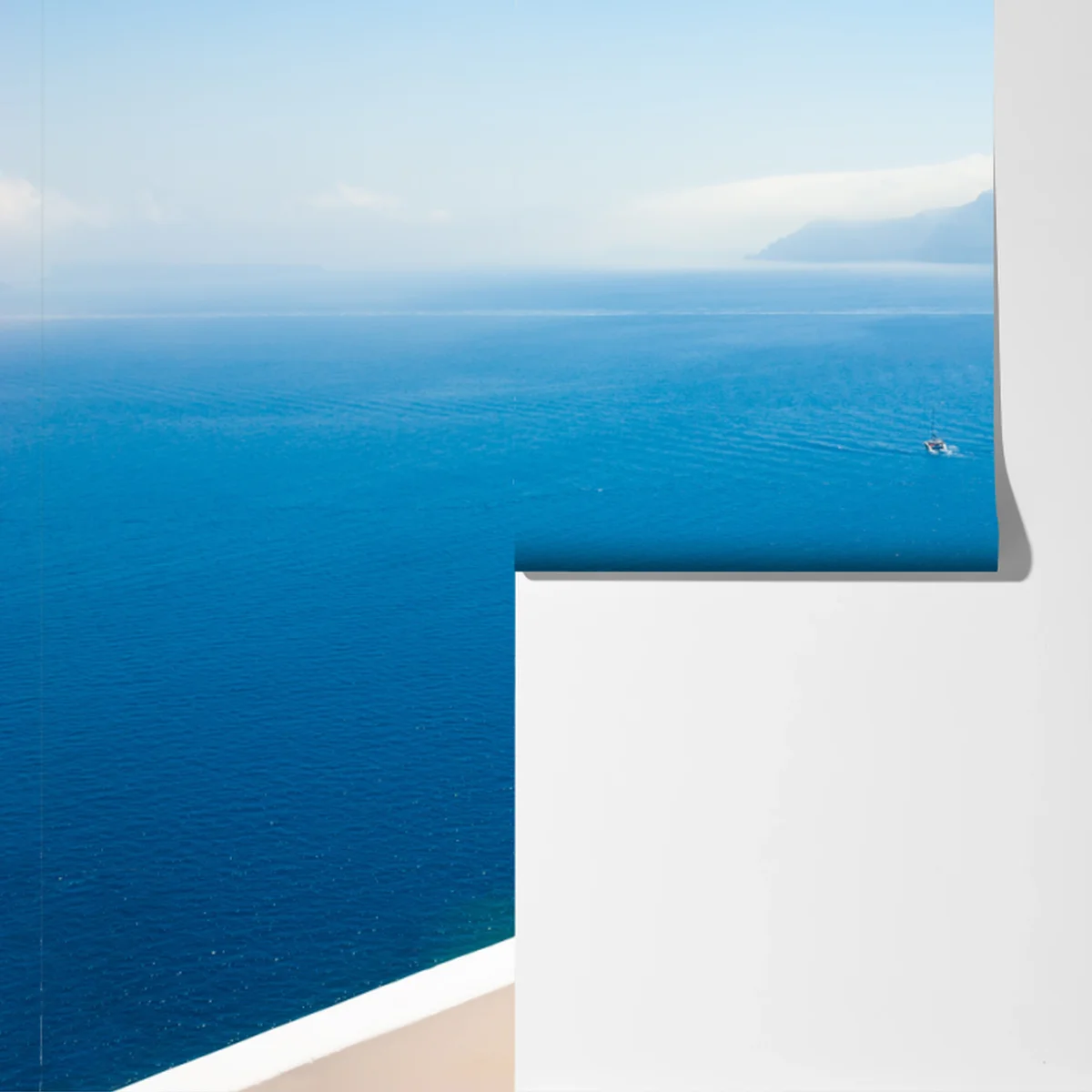 Fototapete Santorini küstenblick mit weißer architektur Fototapete Santorini küstenblick mit weißer architektur