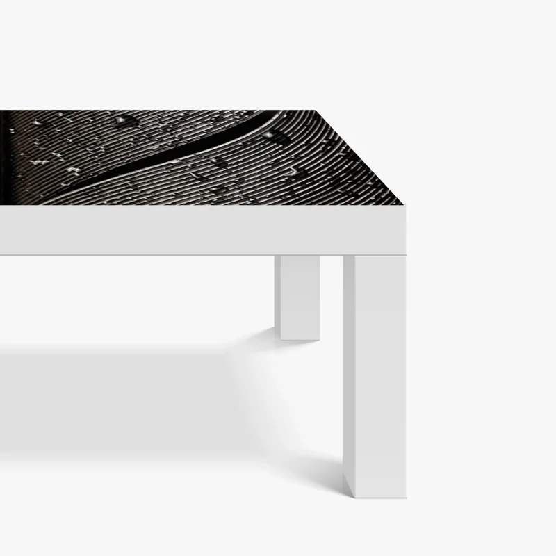 Tischaufkleber und Schreibtischaufkleber monochrome feder mit wassertropfen