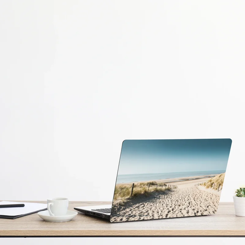 Naklejka na laptopa wydmy i spokojne morze przy Noordwijk