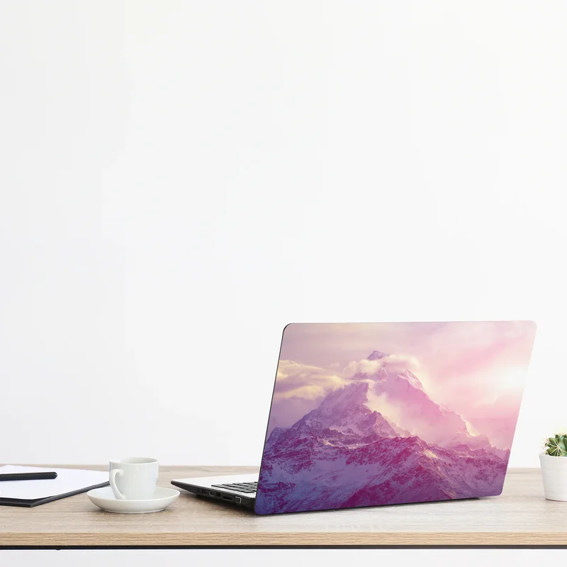 Naklejka na laptopa pastelowy wschód słońca nad górami