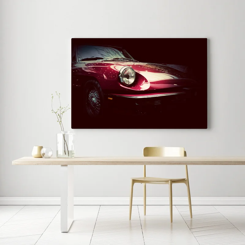 Leinwandbild nahaufnahme eines klassischen roten sportwagens Leinwandbild nahaufnahme eines klassischen roten sportwagens