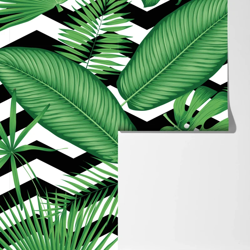 Fototapete tropisches blättermuster auf zickzack-hintergrund Fototapete tropisches blättermuster auf zickzack-hintergrund