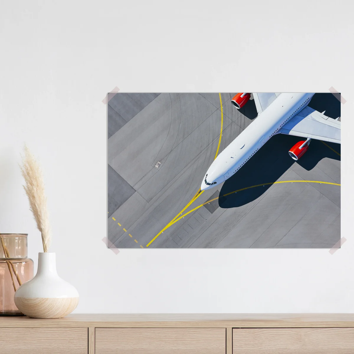 Poster luftaufnahme eines flugzeugs auf dem rollfeld Poster luftaufnahme eines flugzeugs auf dem rollfeld