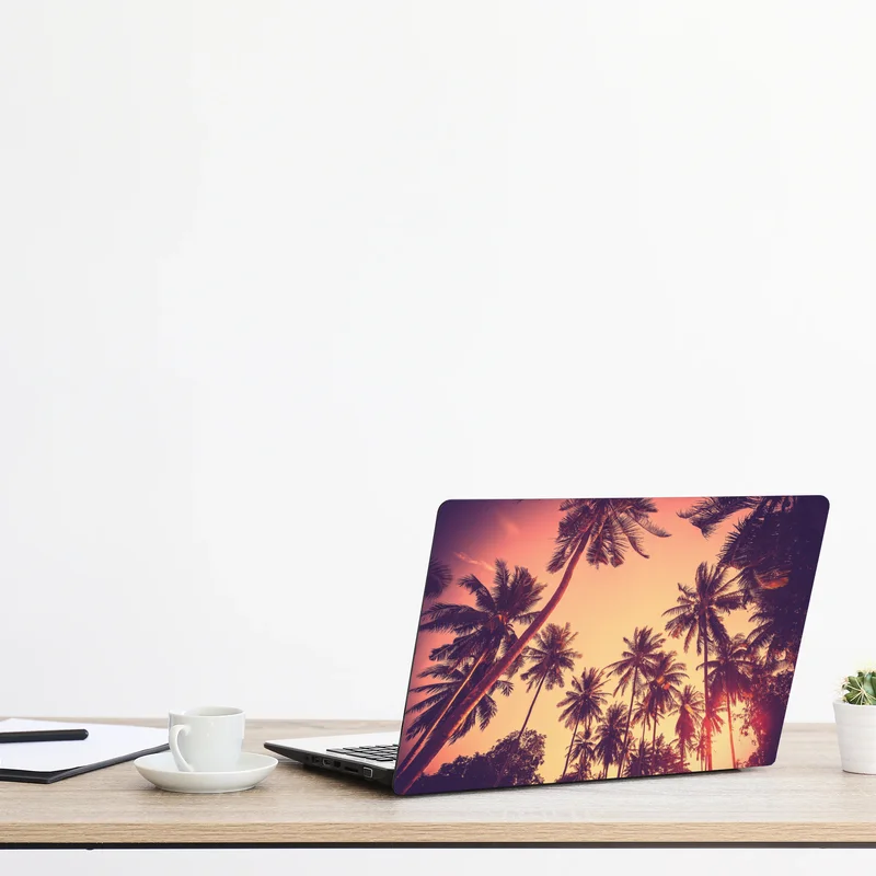 Naklejka na laptopa vintage tropikalny zachód słońca z palmami