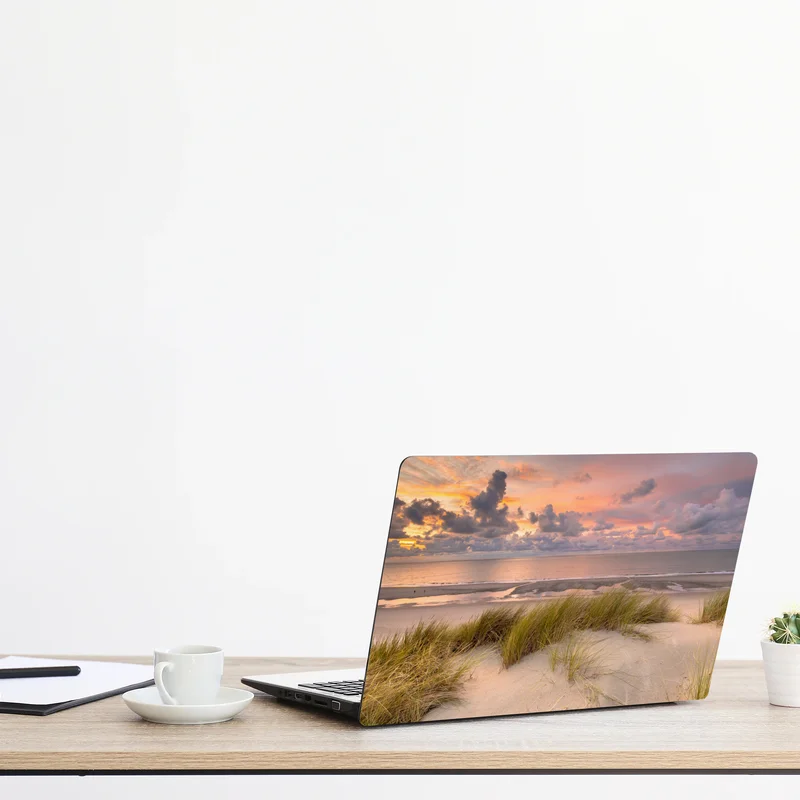 Naklejka na laptopa zachód słońca nad wydmami Zeeland Naklejka na laptopa zachód słońca nad wydmami Zeeland