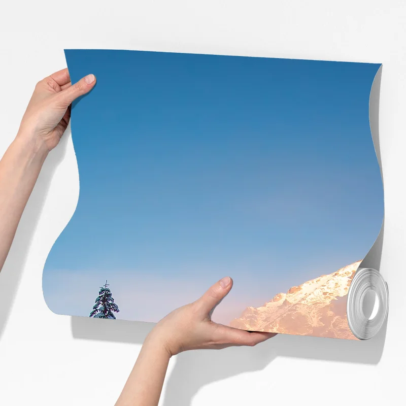 Fototapeta zima o wschodzie nad zaśnieżonym jeziorem górskim Fototapeta zima o wschodzie nad zaśnieżonym jeziorem górskim