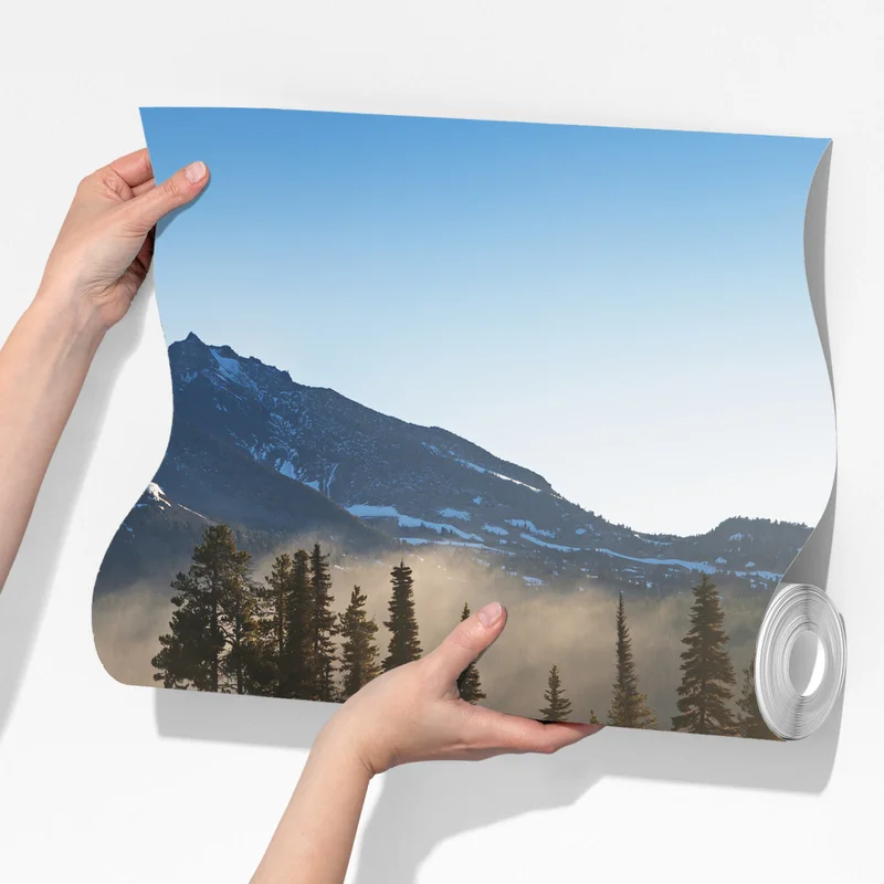 Fototapete nebliger bergsonnenaufgang mit spiegelung Fototapete nebliger bergsonnenaufgang mit spiegelung