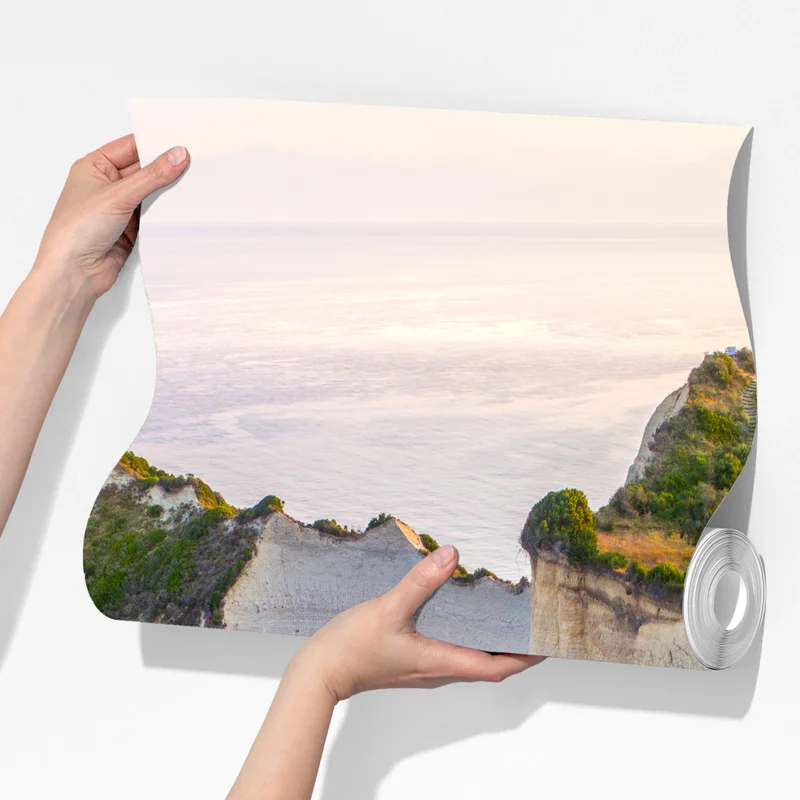 Fototapete luftaufnahme von klippen und türkisfarbenem meer Fototapete luftaufnahme von klippen und türkisfarbenem meer