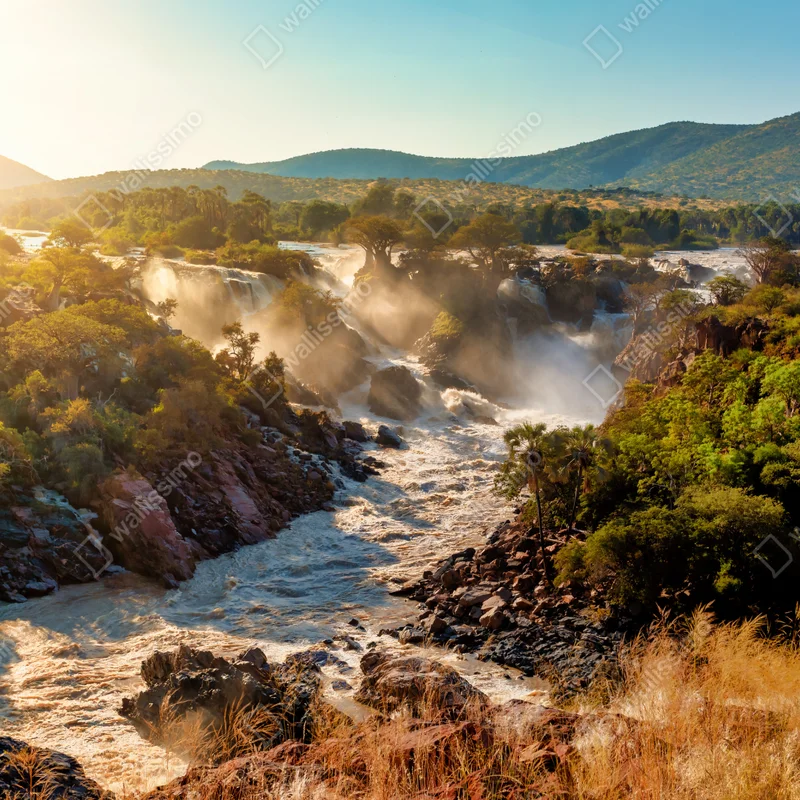 Repositionierbarer Aufkleber sonnenaufgang über Epupa-wasserfälle Repositionierbarer Aufkleber sonnenaufgang über Epupa-wasserfälle