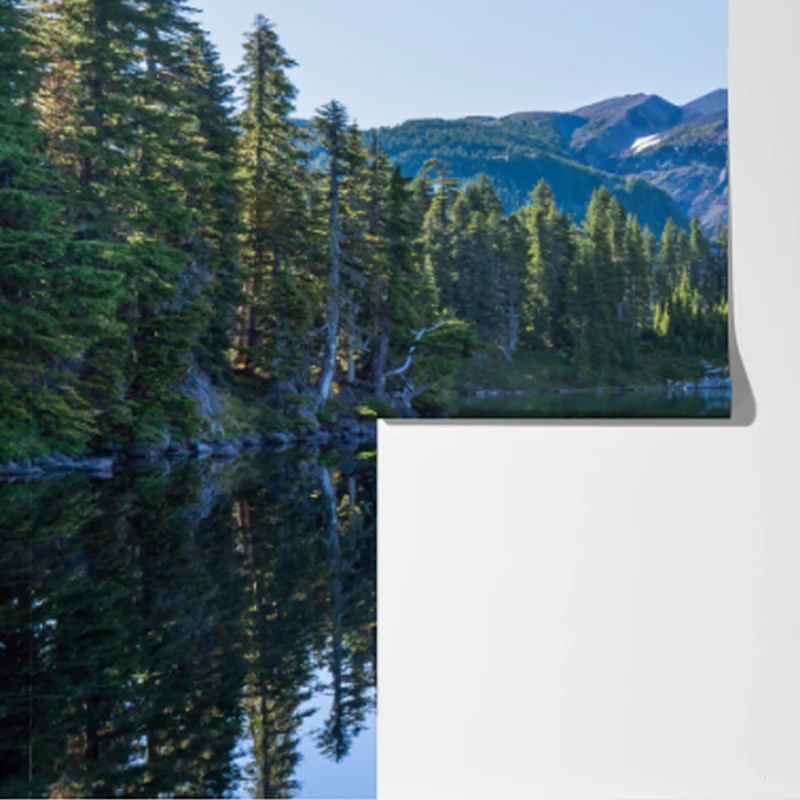 Fototapete ruhiger bergsee mit spiegelndem bergpanorama Fototapete ruhiger bergsee mit spiegelndem bergpanorama