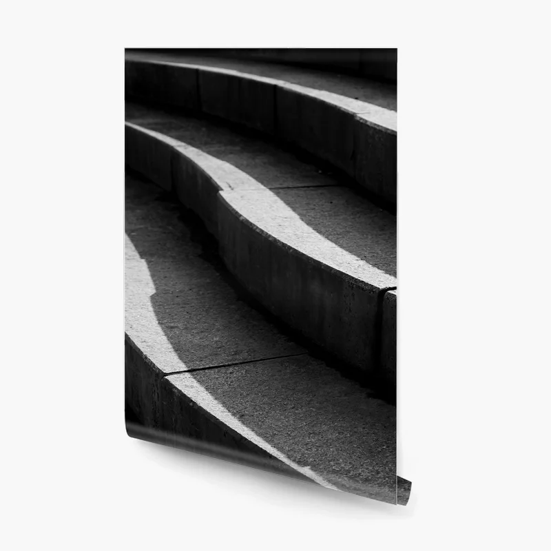 Fototapeta zakrzywione betonowe schody w cieniu Fototapeta zakrzywione betonowe schody w cieniu