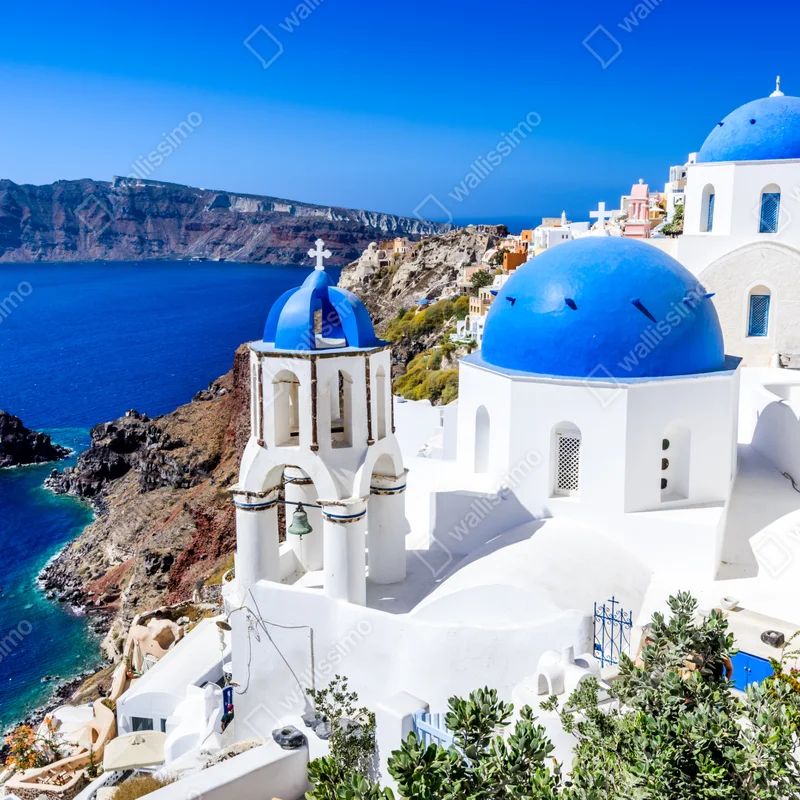 Leinwandbild Santorini blaue kuppeln über der kaldera Leinwandbild Santorini blaue kuppeln über der kaldera