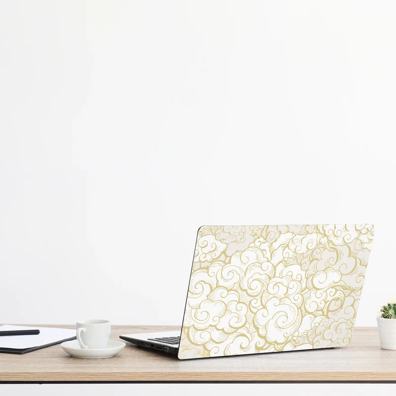 Naklejka na laptopa ornamentalny złoty wzór chmur