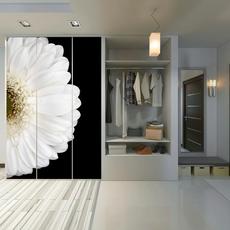 Schrankaufkleber weiße gerbera auf schwarzem hintergrund minimalistische nahaufnahme