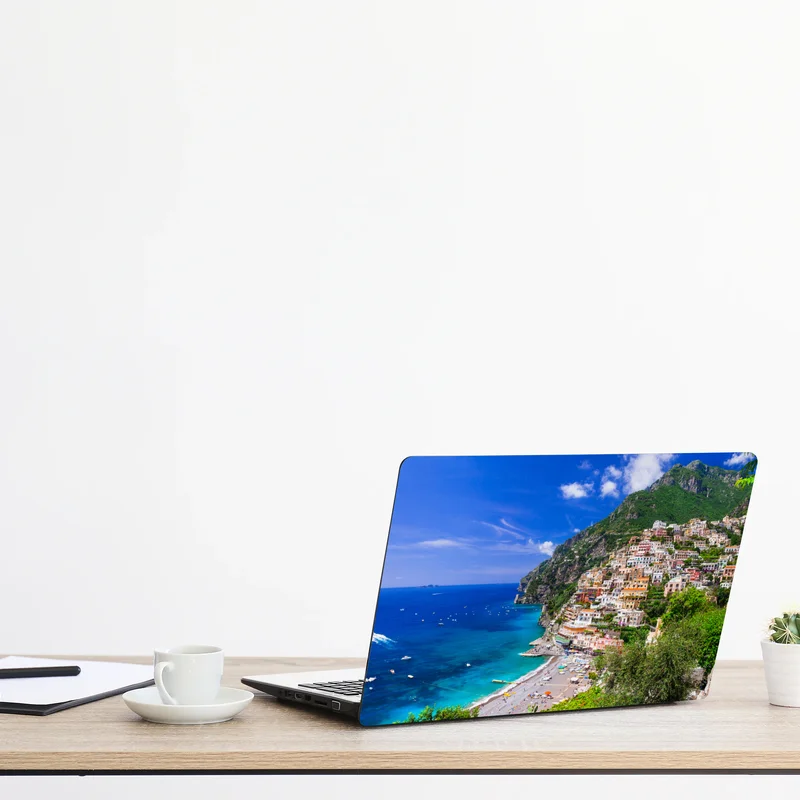 Naklejka na laptopa słoneczna panorama Positano na Wybrzeżu Amalfi