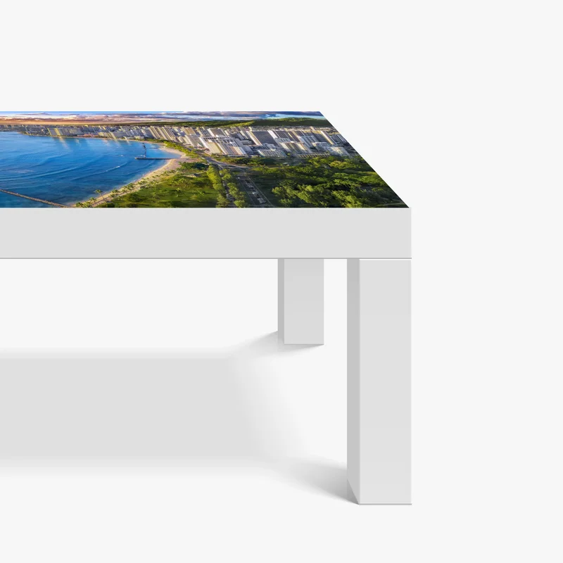 Tischaufkleber und Schreibtischaufkleber skyline einer küstenstadt bei sonnenuntergang