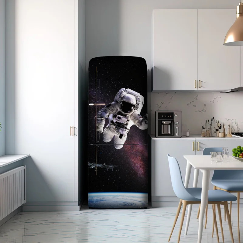 Kühlschrankaufkleber astronaut über der Erde und galaxie