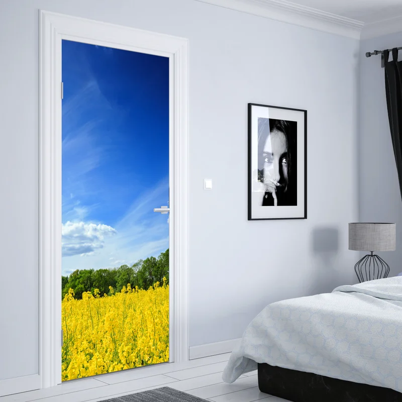 Türaufkleber polnisches rapsfeld unter blauem himmel